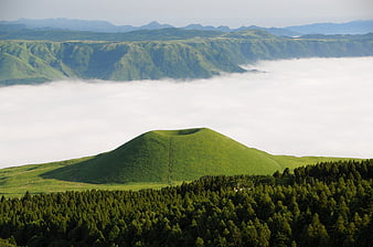 Komezuka Hill Rising Above Sea of Clouds in Aso, Japan