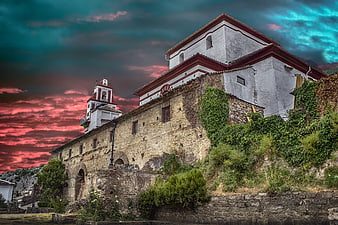 Historic Church In Grazalema Under Dramatic Colorful Sky