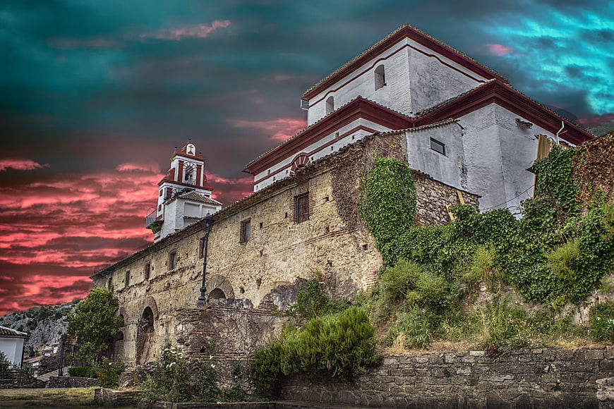 Historic Church In Grazalema Under Dramatic Colorful Sky