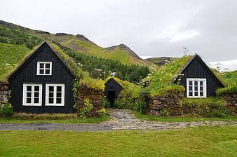Traditional Icelandic Turf Houses With Moss Roofs In Skogafoss