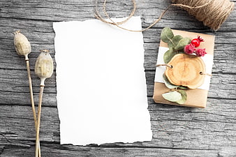 Rustic Gift Box and Blank Paper on Wooden Background