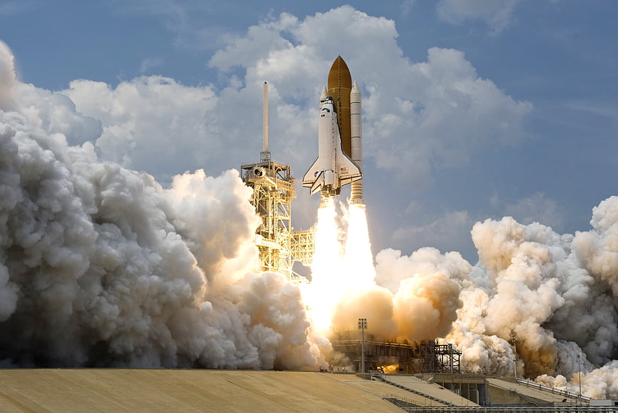 Space Shuttle Launch with Massive Smoke Plumes