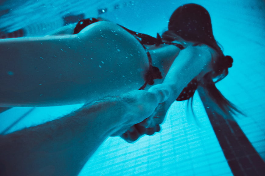 Underwater shot of woman swimming in pool