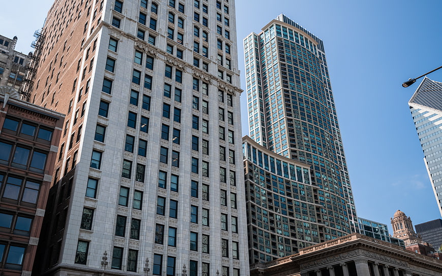 Low angle view of modern and historic city skyscrapers