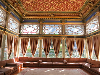 Ornate Ottoman Interior with Gold Ceiling and Large Windows