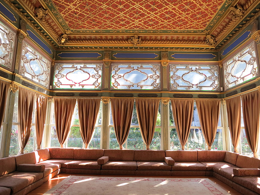 Ornate Ottoman Interior with Gold Ceiling and Large Windows