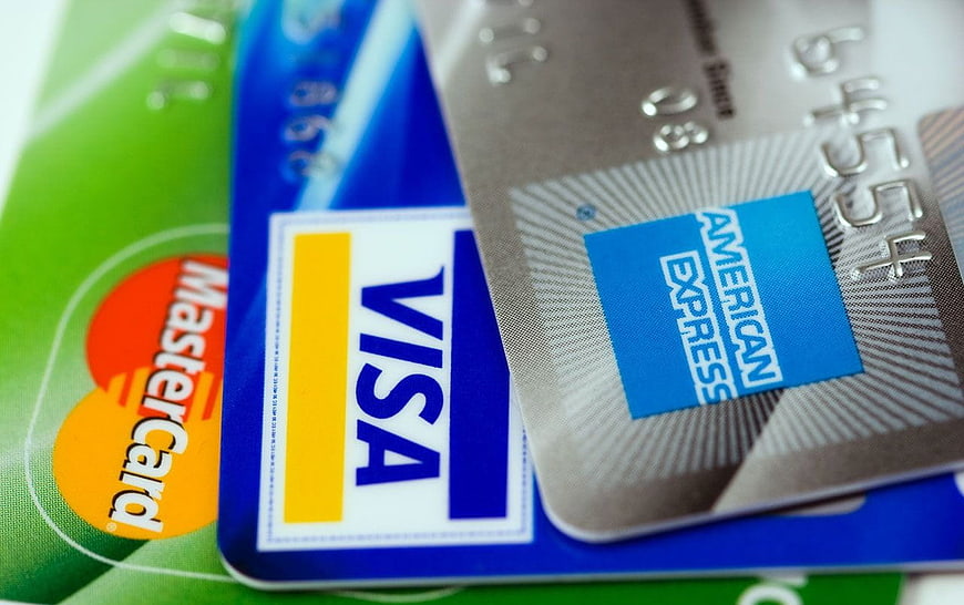 Close-up of Visa, MasterCard, and American Express credit cards