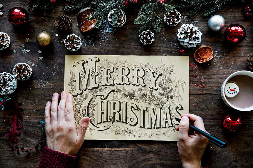 Hand Lettering Merry Christmas Card on Wooden Table