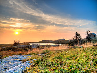 Scenic Mountain Sunset Landscape with Lake and Cabin