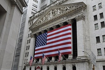 New York Stock Exchange with Large American Flag