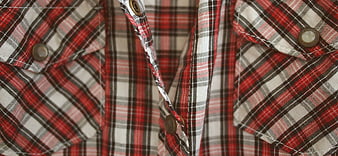 Close-up of red plaid flannel shirt texture