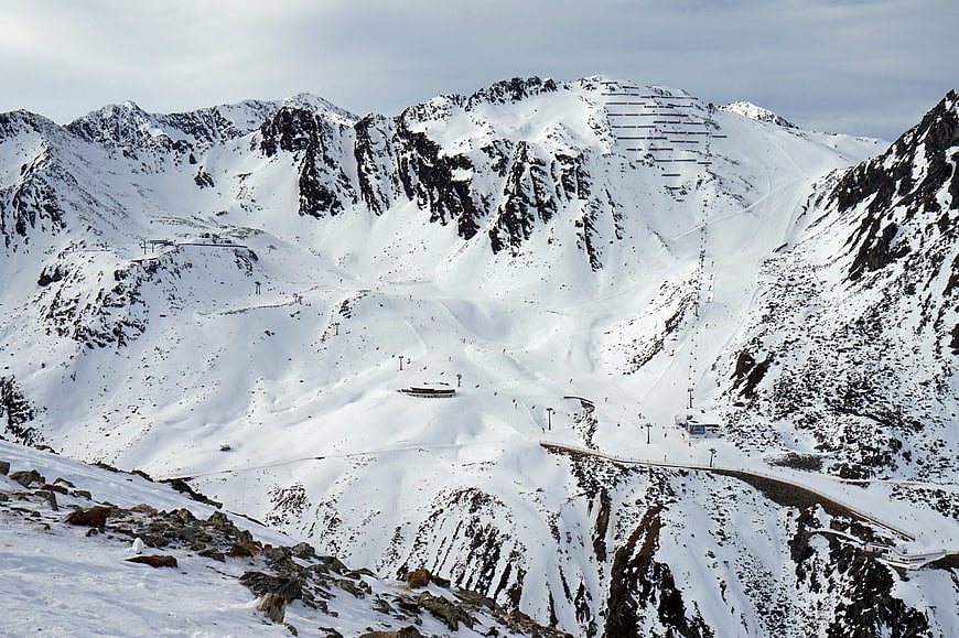 Wide view of snowy ski slopes in the Austrian Alps