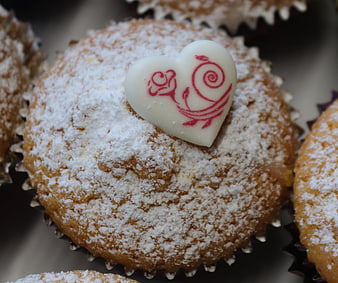 Close-up of Powdered Muffin with Heart Decoration