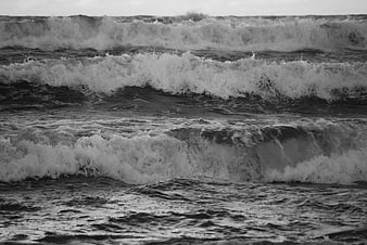 Black and white crashing ocean waves on a stormy sea