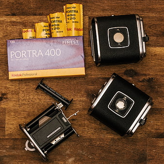 Vintage Hasselblad Camera and Kodak Portra Film Flat Lay