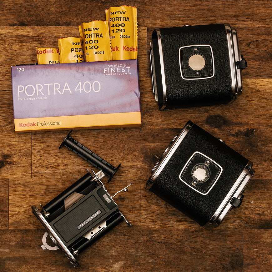 Vintage Hasselblad Camera and Kodak Portra Film Flat Lay