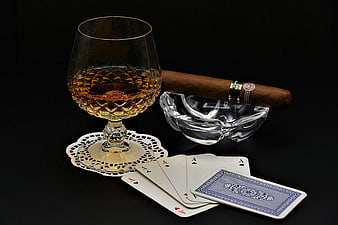Luxury Still Life With Whiskey Glass, Cigar, Ashtray, And Playing Cards