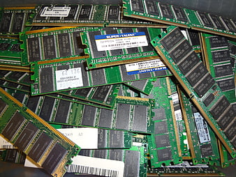 Pile of Used Computer RAM Memory Sticks and Circuit Boards