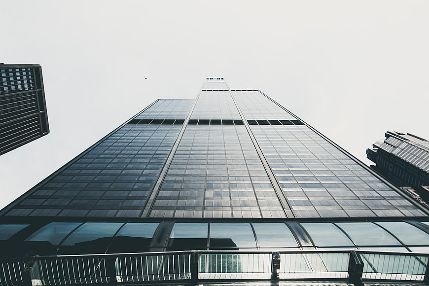 Low angle view of modern glass skyscraper architecture