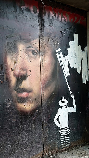 Urban Street Art Graffiti Portrait on Weathered Wall