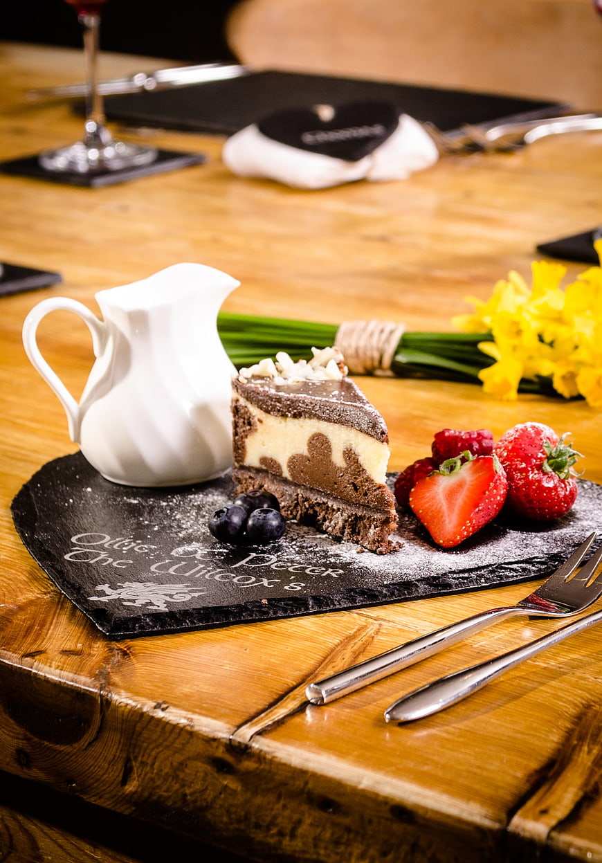 Chocolate Marble Cake Slice with Fresh Berries on Slate
