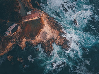 Aerial View of Coastal Cliff and Ocean Waves