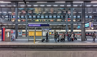Passengers Waiting At Berlin Hauptbahnhof Train Station Platform