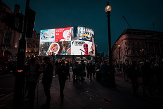 Leicester Square London Night Scene With Bright Digital Billboards