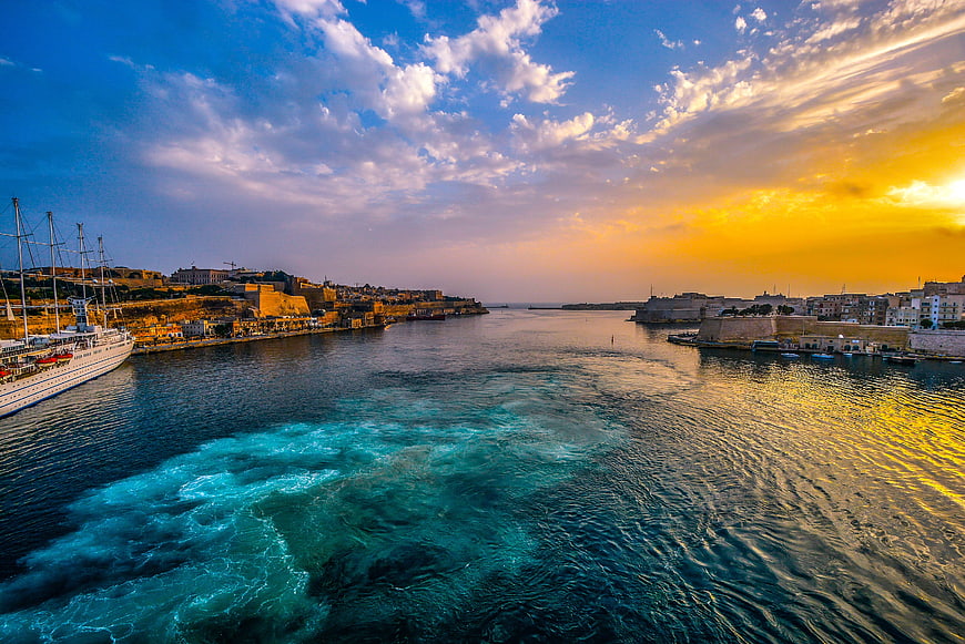 Sunset View of Valletta Grand Harbour Malta with Ship Wake