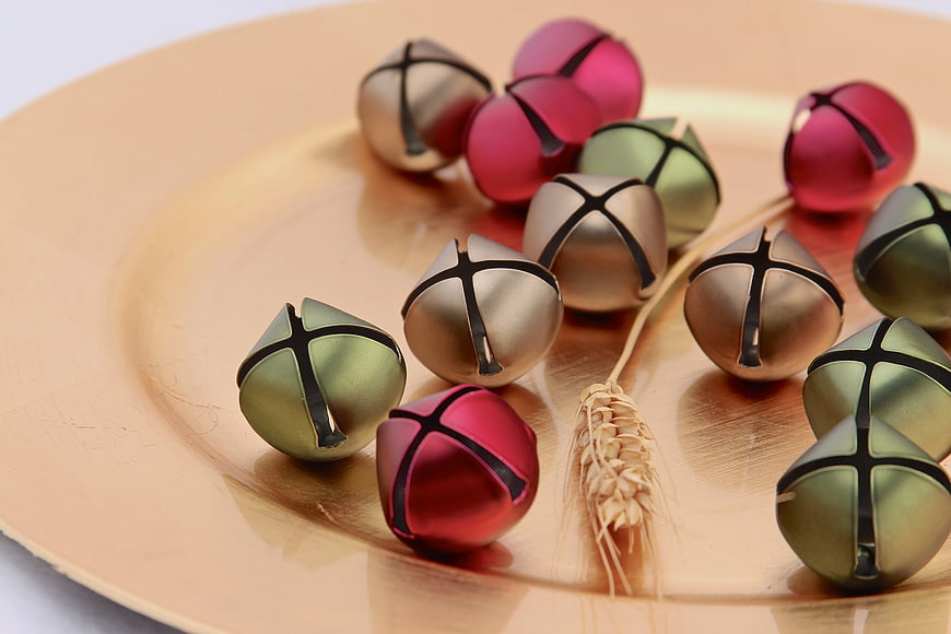 Colorful Christmas Bells on Gold Plate with Wheat
