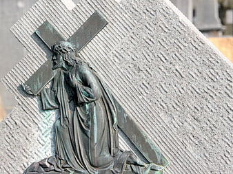 Bronze Statue of Jesus Carrying the Cross on Stone Monument