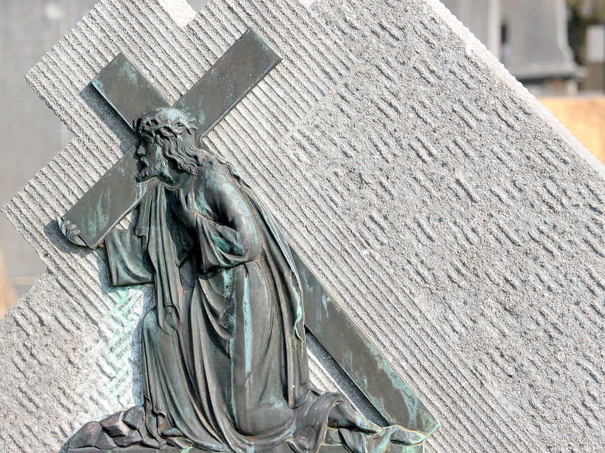 Bronze Statue of Jesus Carrying the Cross on Stone Monument