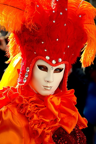 Vibrant Red Carnival Mask with Feathers and Jewels