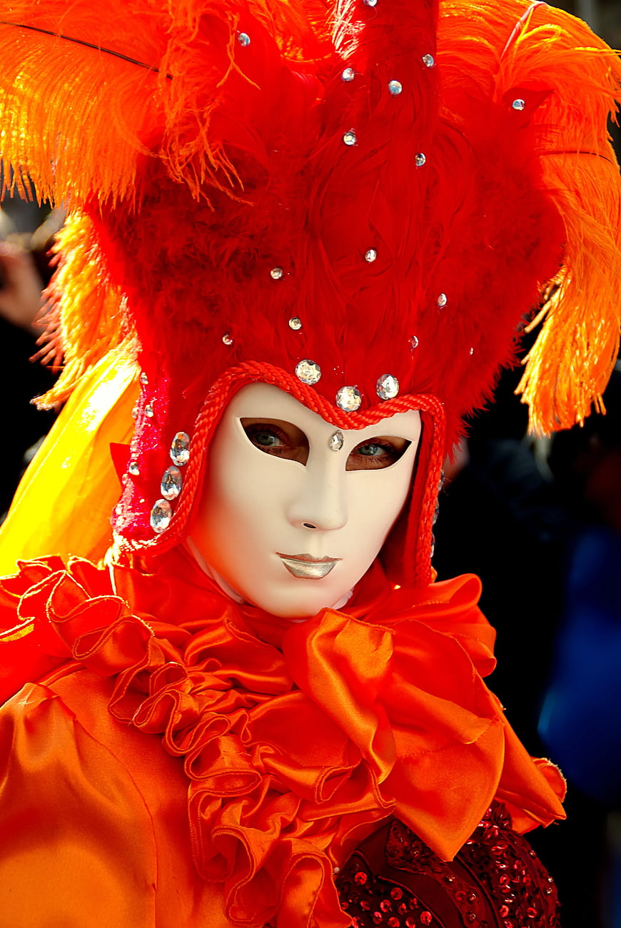 Vibrant Red Carnival Mask with Feathers and Jewels