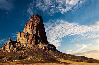 Dramatic Red Rock Butte in Arid Desert Landscape