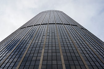 Low angle view of modern glass skyscraper architecture