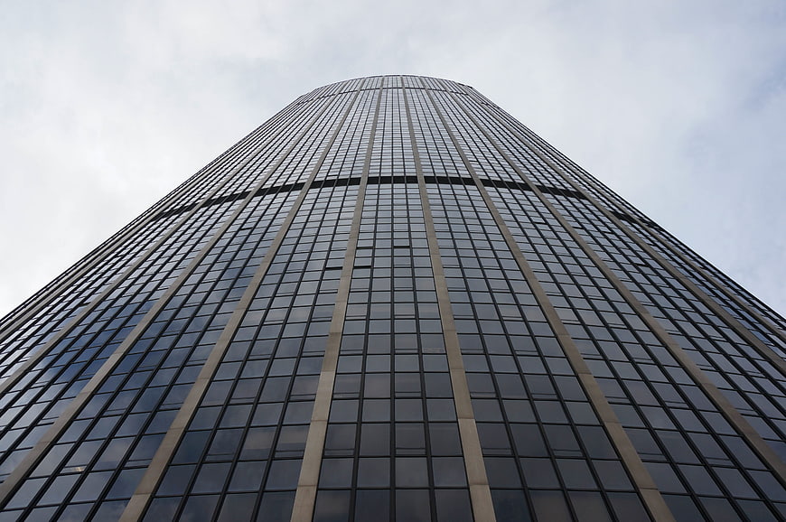 Low angle view of modern glass skyscraper architecture