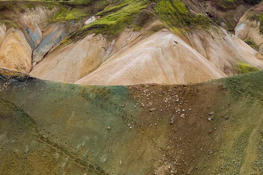 Colorful volcanic hills with mossy green and earthy tones