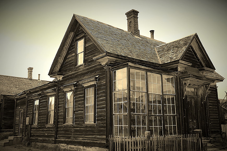 Weathered wooden historic house exterior in a ghost town