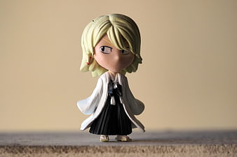 Chibi anime figurine of a blonde character in traditional Japanese clothing
