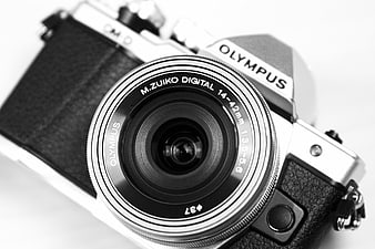 Black and White Close-Up of Vintage Olympus Camera Lens