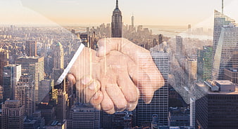 Business Handshake Over City Skyline With Digital Overlay