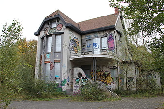 Abandoned House Covered in Colorful Graffiti Art