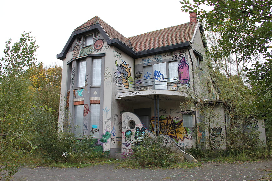 Abandoned House Covered in Colorful Graffiti Art