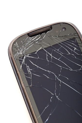 Close-up of a Smartphone with a Shattered Screen