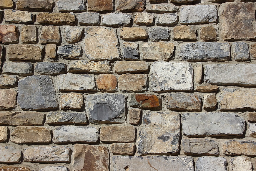 Textured Gray and Brown Stone Wall Background