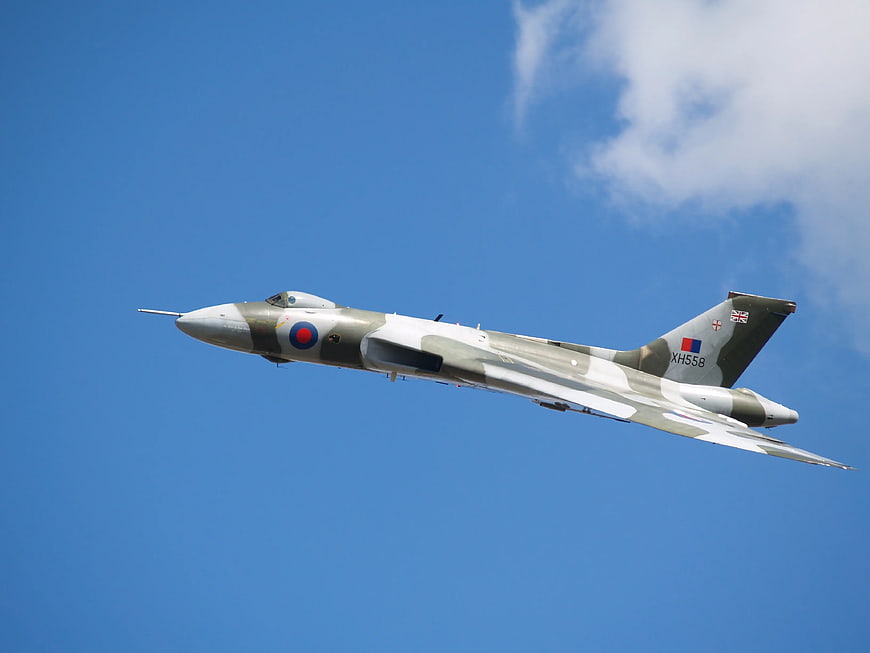 English Electric Lightning Fighter Jet in Flight Against Blue Sky