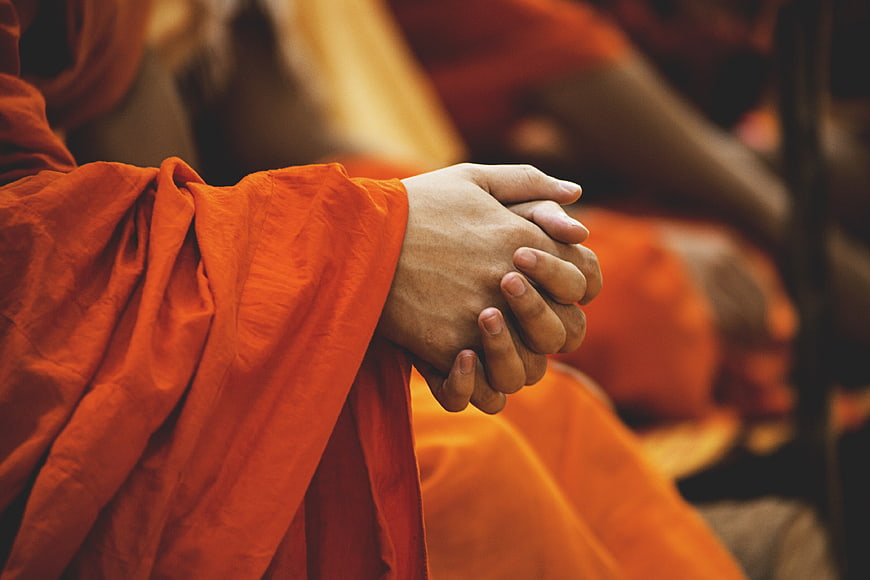 Close-up of Buddhist Monk Hands in Prayer