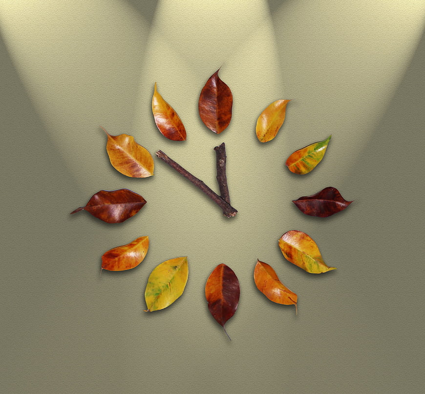 Autumn Leaves Clock Concept on Textured Background