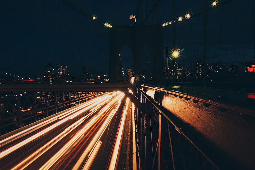 Long exposure light trails on Brooklyn Bridge at night